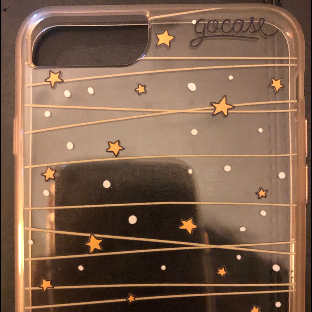 A clear TPU case with elephants looking at stars!